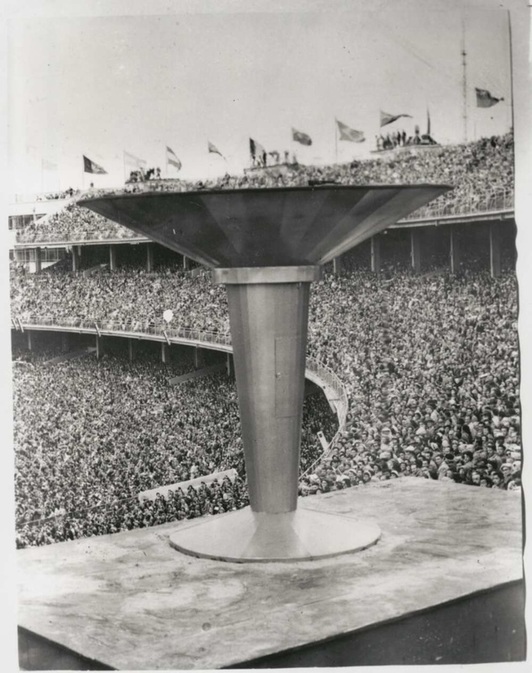 The flame in the cauldron goes out during the closing ceremony of the Melbourne Olympics