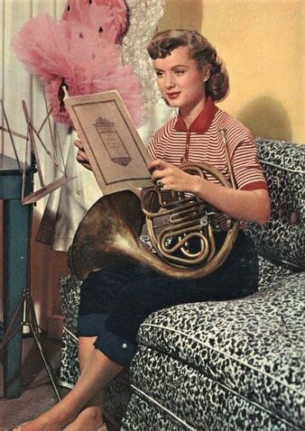 Young Debbie Reynolds with her French Horn