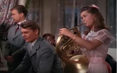 Debbie Reynolds playing french horn in 'Two weeks with love'