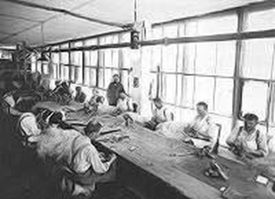 Margarete's team of workers in her factory